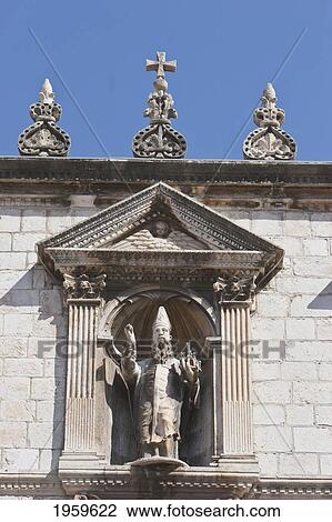 Stock Image - Statue At The Entrance Of Sponza Palace And Historic Archives, Dubrovnik, Dubrovnik-Neretva, Croatia. Fotosearch