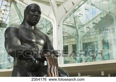 Stock Photograph - Statue at the Hawaii Convention Center; Oahu, Hawaii, United States of America. Fotosearch