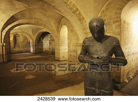Statue by Antony Gormley in the Norman Crypt of Winchester Cathedral; Winchester, Hampshire, England View Large Photo Image Stock Photo - Statue by Antony Gormley in the Norman Crypt of Winchester Cathedral; Winchester, Hampshire, England. Fotosearch
