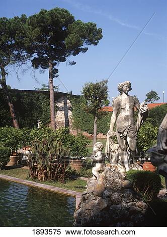 Statue By Pond In Garden View Large Photo Image Stock Photography - Statue By Pond In Garden. Fotosearch