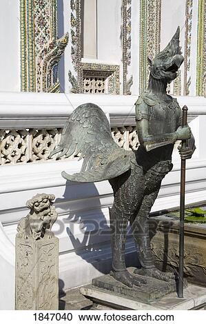 Stock Image - Statue Guarding Phra Wiharn Yod At Royal Grand Palace In Rattanakosin District; Bangkok, Thailand. Fotosearch