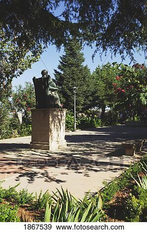 Stock Photo - Statue In Small Park, Ronda, Spain. Fotosearch