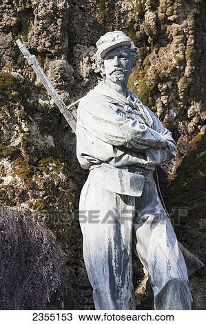 Statue of a soldier resting against the rock of the monument to Garibald; Venice, Italy View Large Photo Image Stock Image - Statue of a soldier resting against the rock of the monument to Garibald; Venice, Italy. Fotosearch
