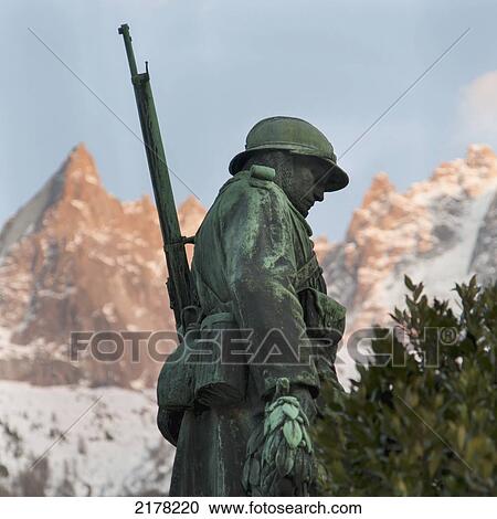 Statue Of A War Soldier With The French Alps In The Background; Chamonix-Mont-Blanc Rhone-Alpes France View Large Photo Image Stock Image - Statue Of A War Soldier With The French Alps In The Background; Chamonix-Mont-Blanc Rhone-Alpes France. Fotosearch