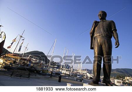 Statue Of Aristotle Onassis, Local Harbour In Background View Large Photo Image Stock Image - Statue Of Aristotle Onassis, Local Harbour In Background. Fotosearch