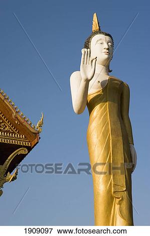 Stock Photo - Statue Of Buddha At Wat That Luang Tai, Vientiane, Laos. Fotosearch