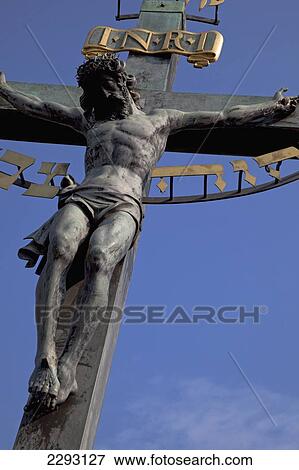 Stock Photo - Statue of Christ, Charles Bridge, Prague, Czech Republic, Europe. Fotosearch