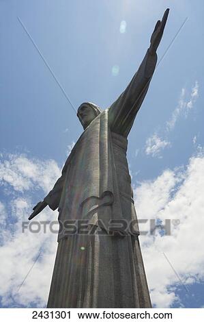 Stock Image - Statue of Christ the Redeemer on Corcovado mountain; Rio de Janeiro, Brazil. Fotosearch