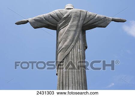 Stock Image - Statue of Christ the Redeemer on Corcovado mountain; Rio de Janeiro, Brazil. Fotosearch