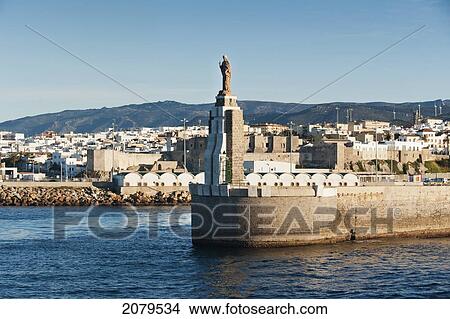 Picture - Statue Of El Santo In The Port Of Tarifa; Tarifa Cadiz Andalusia Spain. Fotosearch