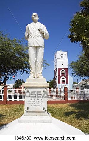 Stock Image - Statue Of Jan Hendrik Albert Eman In Front Of Fort Zoutman; Oranjestad, Island Of Aruba, Aruba, Kingdom Of The Netherlands. Fotosearch