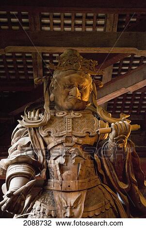 Stock Image - Statue Of Japanese Warrior In A Temple; Nara, Japan. Fotosearch