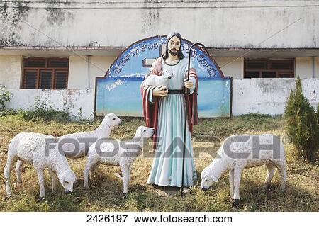 Statue of Jesus and sheep with a cross in the background; Visakhapatnam, Andhra Pradesh, India View Large Photo Image Stock Photo - Statue of Jesus and sheep with a cross in the background; Visakhapatnam, Andhra Pradesh, India. Fotosearch