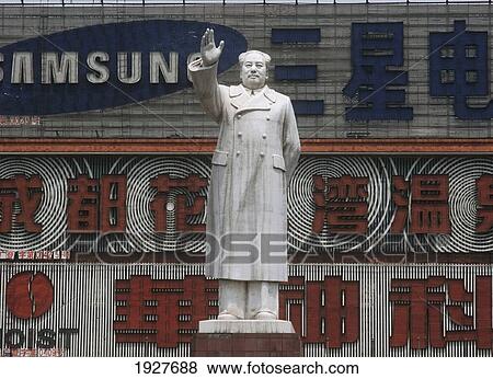 Stock Photo - Statue Of Mao, Advertisements Behind. Fotosearch