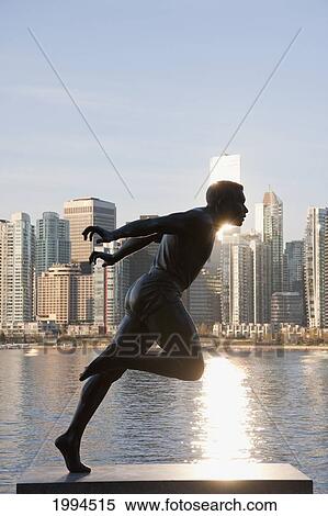 Statue Of Olympic Runner, Harry Jerome In Stanley Park At Sunrise, Vancouver, British Columbia, Canada View Large Photo Image Stock Photography - Statue Of Olympic Runner, Harry Jerome In Stanley Park At Sunrise, Vancouver, British Columbia, Canada. Fotosearch