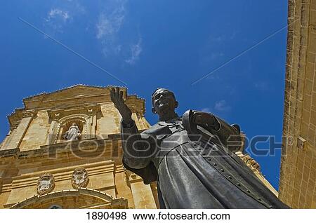 Stock Photo - Statue Of Pope John Paul Ii In Front Of Gozo Cathedral. Fotosearch