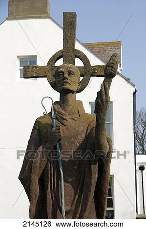 Stock Photograph - Statue of Saint Aidan, Lindisfarne Abbey; Lindisfarne, Northumberland, England. Fotosearch