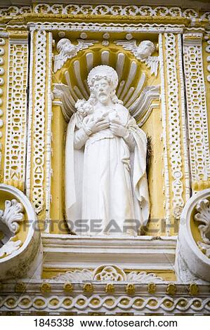 Statue Of Saint In Church's Facade, Close Up; Antigua, Guatemala View Large Photo Image Stock Photo - Statue Of Saint In Church's Facade, Close Up; Antigua, Guatemala. Fotosearch