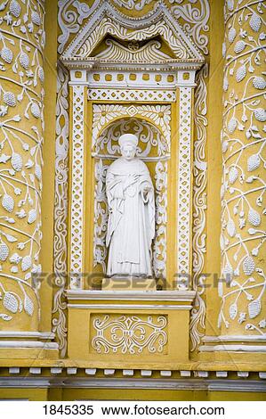 Stock Photography - Statue Of Saint In Church's Facade; Antigua, Guatemala. Fotosearch