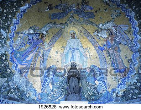 Statue Of St. Bernadette With Mosaic Of The Virgin Mary And Angels View Large Photo Image Stock Photo - Statue Of St. Bernadette With Mosaic Of The Virgin Mary And Angels. Fotosearch
