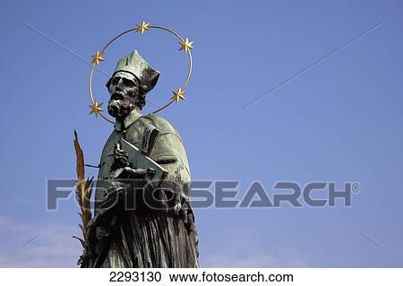 Stock Image - Statue of St John of Nepomuk, Charles Bridge, Prague, Czech Republic, Europe. Fotosearch