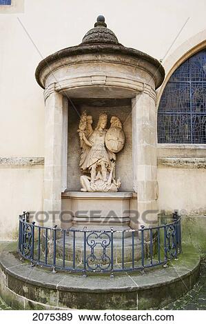 Stock Photo - Statue Of St. Michael By The Eglise St. Michel (St. Michael's Church), Luxembourg. Fotosearch
