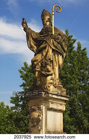 Stock Photography - Statue On Charles Bridge Or Karluv Most; Prague Czech Republic. Fotosearch
