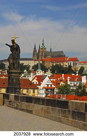 Statue On Charles Bridge With Royal Palace In The Background; Prague Czech Republic View Large Photo Image Stock Photo - Statue On Charles Bridge With Royal Palace In The Background; Prague Czech Republic. Fotosearch