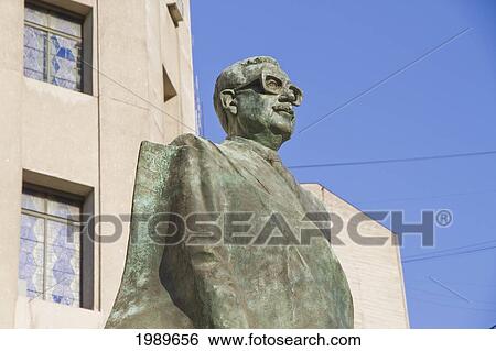 Stock Photograph - Statue to President Salvador Allende Gossens on Plaza de la Constitucion, Santiago, Metropolitan Region, Chile. Fotosearch