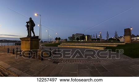 Statues along a promenade and the River Tyne and sunset; South Shields, Tyne and Wear, England View Large Photo Image Stock Photo - Statues along a promenade and the River Tyne and sunset; South Shields, Tyne and Wear, England. Fotosearch