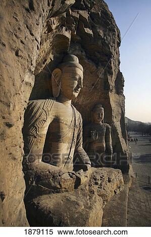 Statues At Ancient Buddhist Temple Grotto. View Large Photo Image Stock Photography - Statues At Ancient Buddhist Temple Grotto.. Fotosearch
