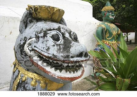 Stock Photo - Statues At Buddhist Wat, Close Up. Fotosearch