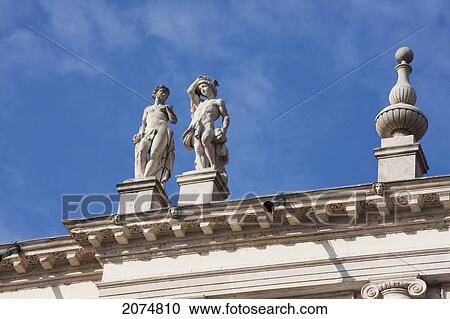 Stock Image - Statues Atop The Palazzo Chiericati By Architect Andrea Palladio, Vicenza, Italy. Fotosearch