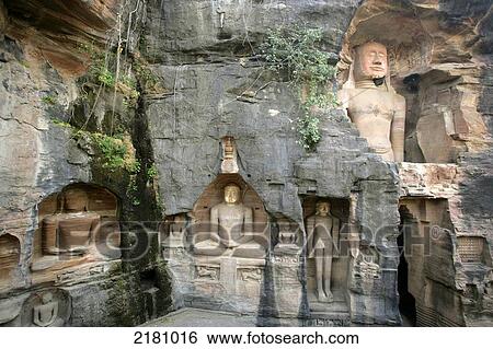 Stock Photograph - Statues Of Jain Gods Gwalior Madhya Pradesh India. Fotosearch