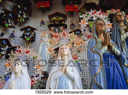 Stock Photo - Statues Of The Virgin Mary With Halos. Fotosearch