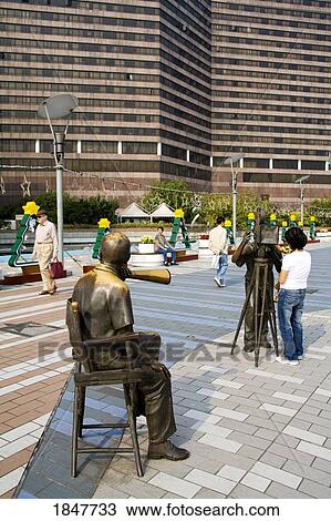 Statues On Avenue Of The Stars In Kowloon District; Hong Kong, Hong Kong Territory, China View Large Photo Image Stock Image - Statues On Avenue Of The Stars In Kowloon District; Hong Kong, Hong Kong Territory, China. Fotosearch