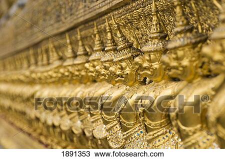 Stock Image - Statues Surrounding Wat Phra Kaew Temple. Fotosearch