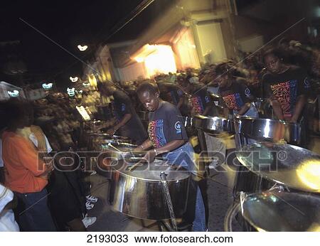 Stock Image - Steel Pan Band On Streets Of St Johns, Antigua. Fotosearch
