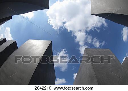 Stelae Of The Memorial To The Murdered Jews Of Europe, Berlin, Germany View Large Photo Image Stock Image - Stelae Of The Memorial To The Murdered Jews Of Europe, Berlin, Germany. Fotosearch