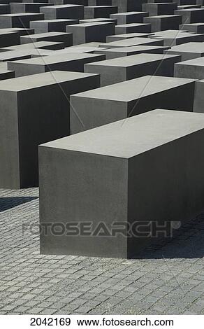 Stelae Of The Memorial To The Murdered Jews Of Europe, Berlin, Germany View Large Photo Image Stock Photo - Stelae Of The Memorial To The Murdered Jews Of Europe, Berlin, Germany. Fotosearch