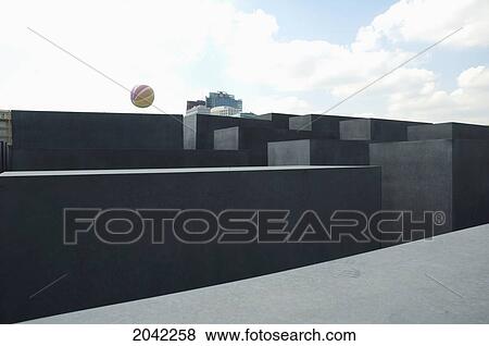 Stelae Of The Memorial To The Murdered Jews Of Europe, Berlin, Germany View Large Photo Image Stock Photo - Stelae Of The Memorial To The Murdered Jews Of Europe, Berlin, Germany. Fotosearch