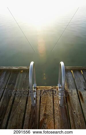 Steps At End Of Pier Leading Into Calm Water, Montego Bay, Jamaica. View Large Photo Image Stock Photograph - Steps At End Of Pier Leading Into Calm Water, Montego Bay, Jamaica.. Fotosearch