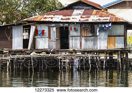 Stilt house in Kampung Ayapo, Lake Sentani, Papua, Indonesia View Large Photo Image Stock Photography - Stilt house in Kampung Ayapo, Lake Sentani, Papua, Indonesia. Fotosearch