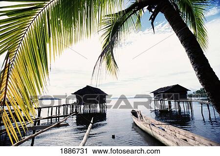 Stilt Huts And Canoe, Koboe View Large Photo Image Stock Image - Stilt Huts And Canoe, Koboe. Fotosearch