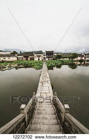 Stone bridge over Nanhu Lake, Hongcun, Anhui, China View Large Photo Image Stock Image - Stone bridge over Nanhu Lake, Hongcun, Anhui, China. Fotosearch