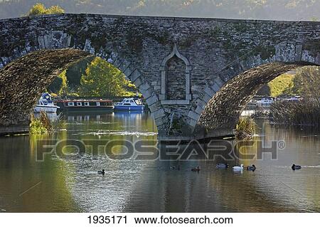 Stone Bridge Over River Barrow; Graiguenamanagh, County Kilkenny, Ireland View Large Photo Image Stock Image - Stone Bridge Over River Barrow; Graiguenamanagh, County Kilkenny, Ireland. Fotosearch