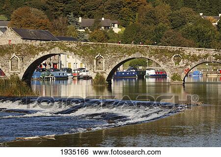 Stock Photograph - Stone Bridge Over River Barrow; Graiguenamanagh, County Kilkenny, Ireland. Fotosearch