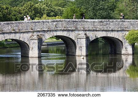 Stock Photography - Stone Bridge Over The Cosson River, Chambord, France. Fotosearch