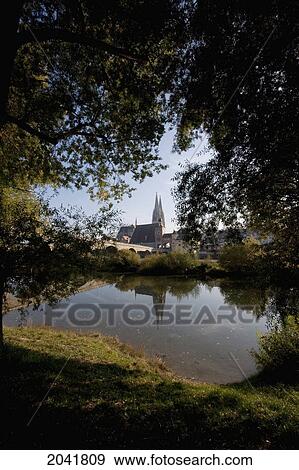 Stock Photo - Stone Bridge Over The Danube River With The Dom St. Peter (St. Peter's Cathedral) In The Background, Regensburg, Bavaria, Germany. Fotosearch