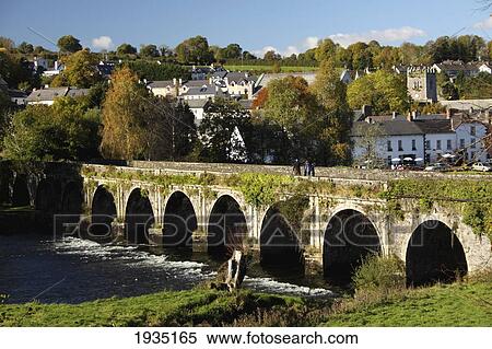 Stone Bridge Over The River Nore; Inistioge, County Kilkenny, Ireland View Large Photo Image Stock Photography - Stone Bridge Over The River Nore; Inistioge, County Kilkenny, Ireland. Fotosearch